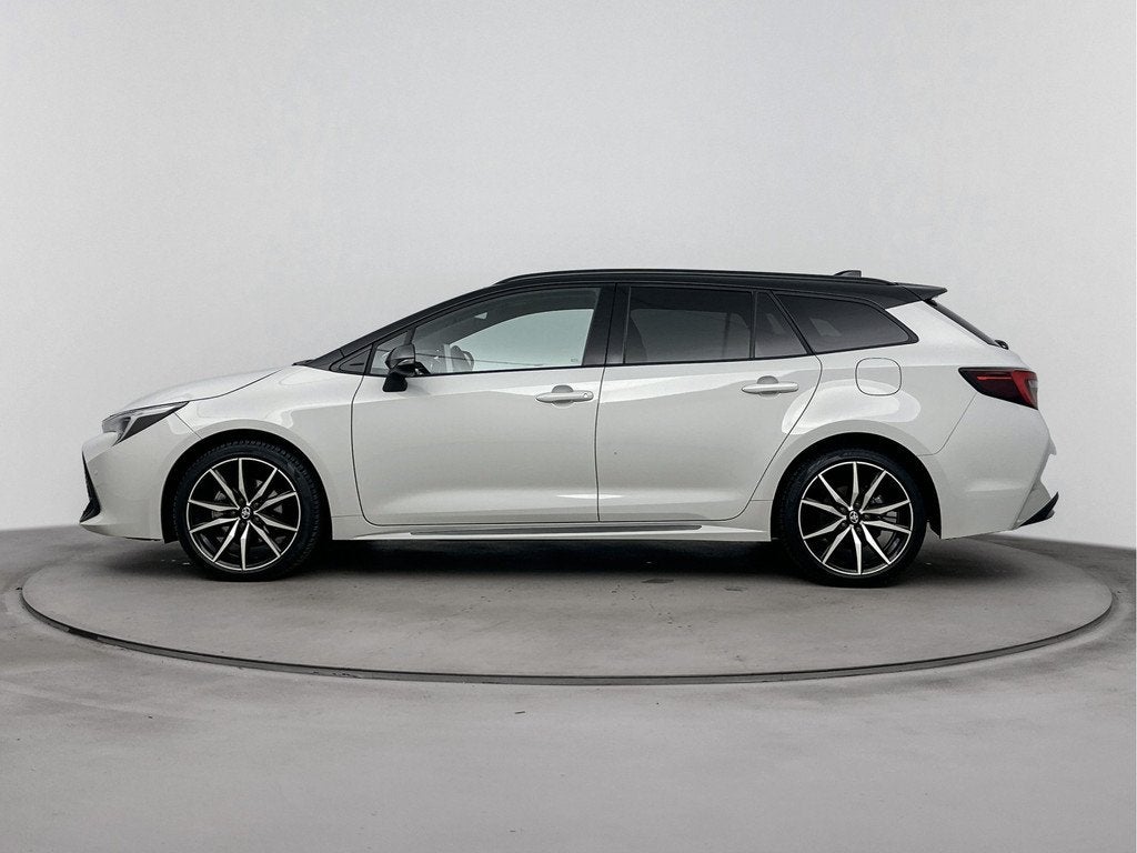 Toyota Corolla Touring Sports Hybrid 200 Business GR Sport P, Auto's, Toyota, 12 maanden, Gebruikt, 4 cilinders, 1415 kg