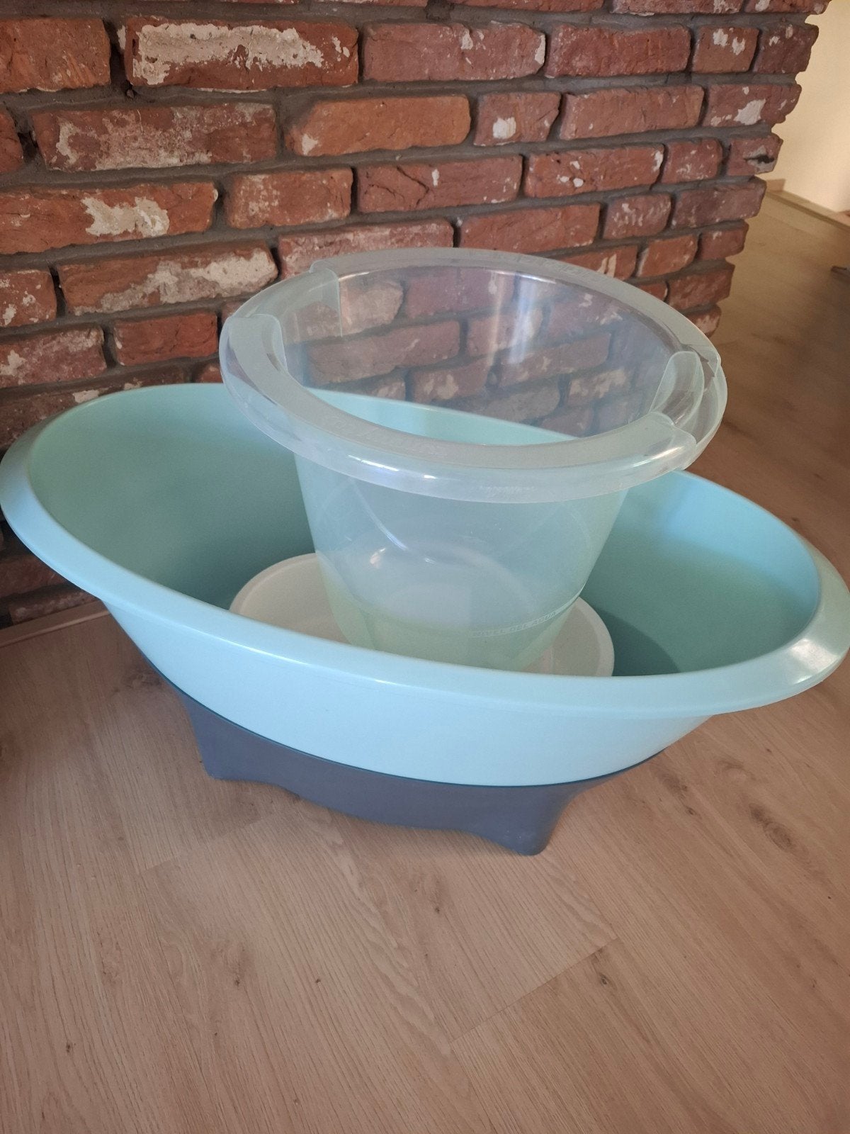Babybad, tummy tub en wasbakje, Ophalen