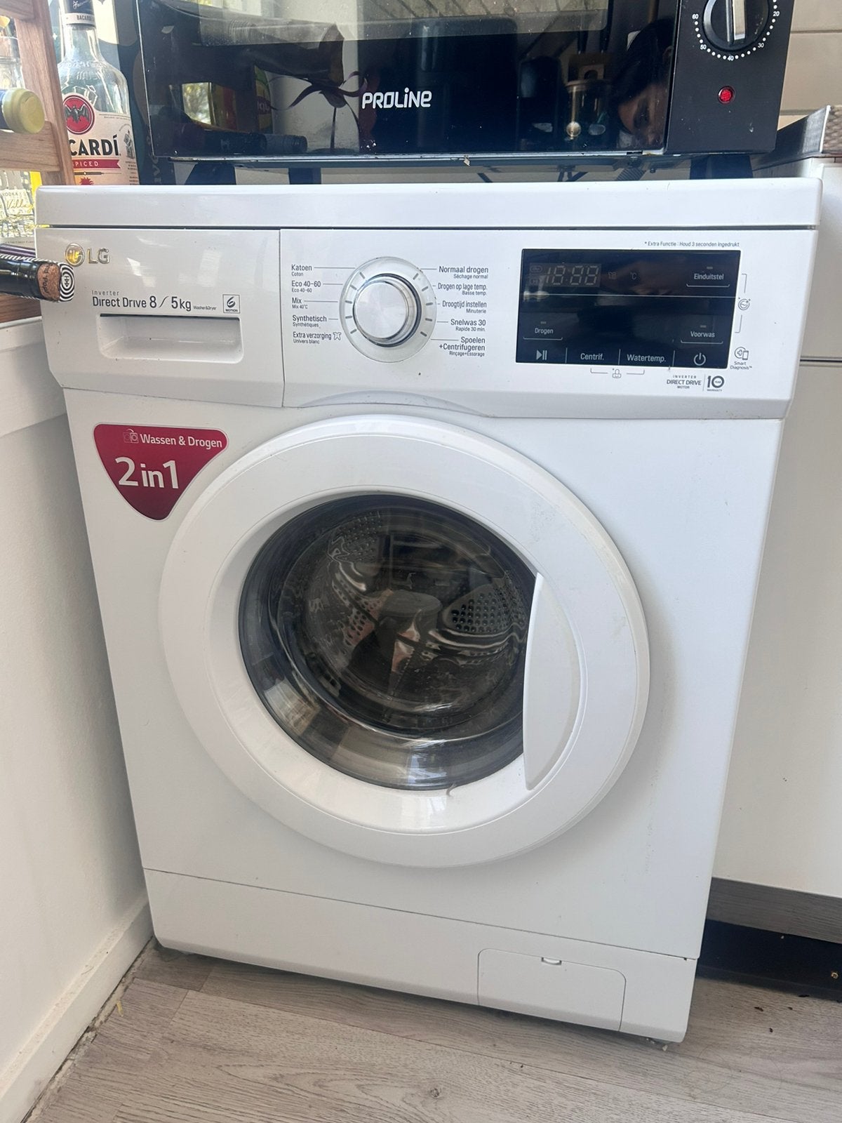 LG Wasmachine & droogcombinatie, Ophalen, Zo goed als nieuw, 85 tot 90 cm, 1200 tot 1600 toeren