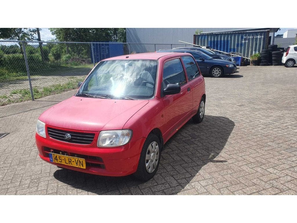 Daihatsu Cuore 1.0 12V DVVT STi Automaat, 45-LR-VN, Auto's, Daihatsu, 15 km/l, 18 €/maand, 4 stoelen, Cuore
