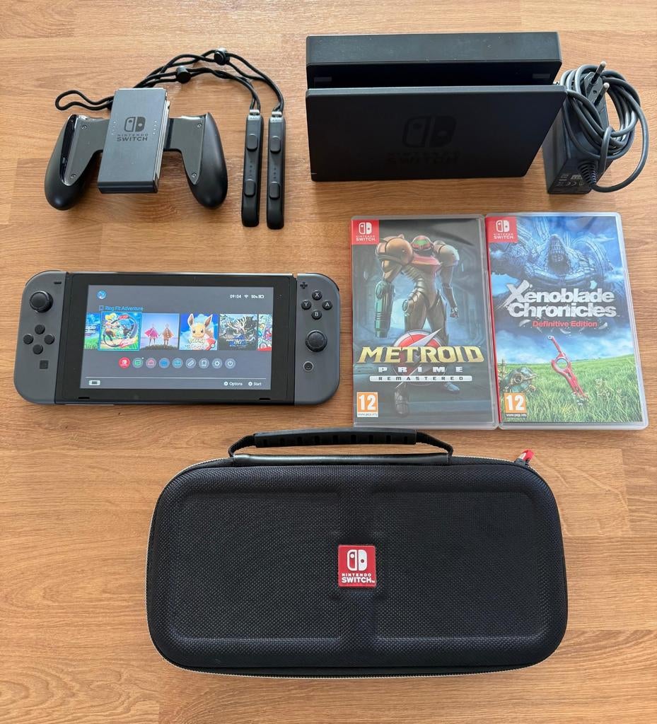 Nintendo Switch met 2 games en accessoires, Spelcomputers en Games, Games | Nintendo Switch, Avontuur en Actie, Gebruikt, 1 speler