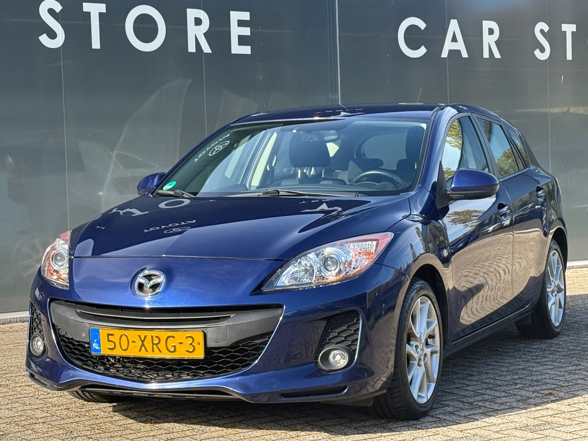 Mazda 3 2.0 Automaat Navigator Navi|Carplay|Stoelver|Trekhaa, Auto's, Euro 5, Stof, Gebruikt, Zwart