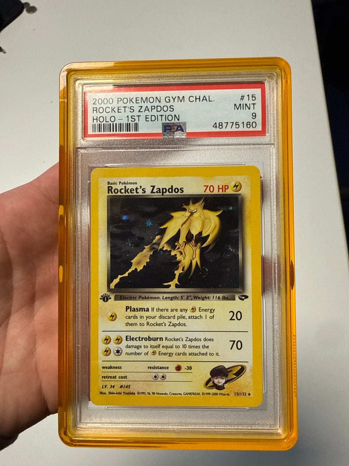 Rocket's Zapdos 1st edition PSA 9 Pokémon kaart, Ophalen of Verzenden, Zo goed als nieuw, Losse kaart, Foil