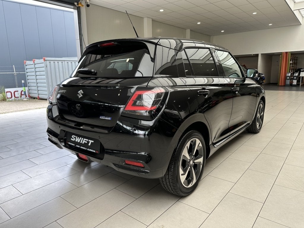 Suzuki Swift 1.2 Style Smart Hybride [ 10JAAR GARANTIE I CAR, Auto's, Suzuki, 12 maanden, Stof, Gebruikt, Zwart