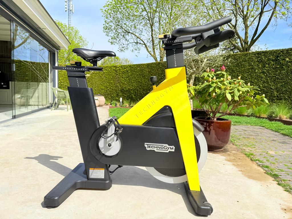 Technogym Spinningbike - Professionele Indoor Fiets, Sport en Fitness, Fitnessapparatuur, Zo goed als nieuw, Spinningfiets, Benen