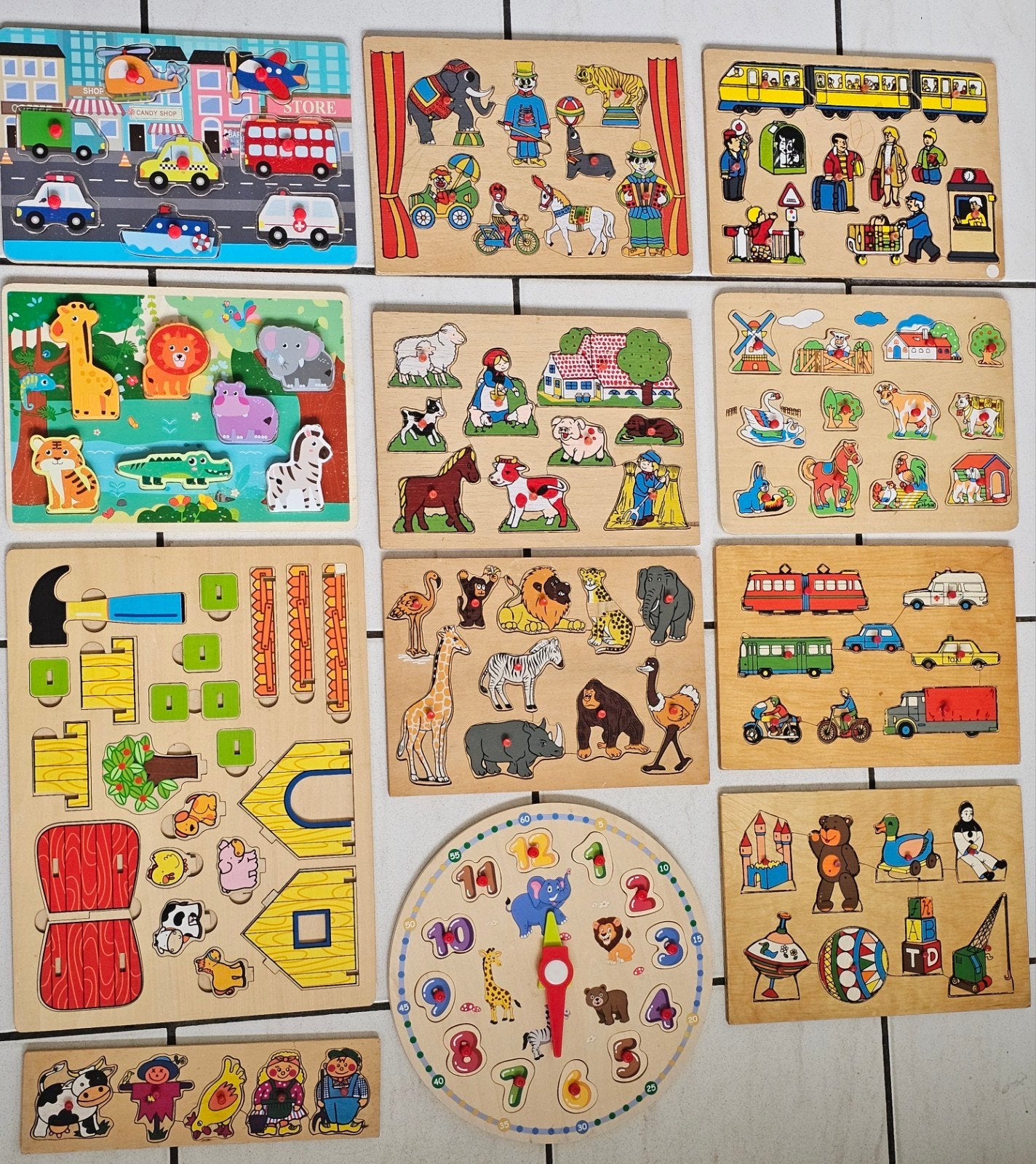 12 houten puzzels. Vintage voor motoriek. Dieren auto's klok, Ophalen of Verzenden