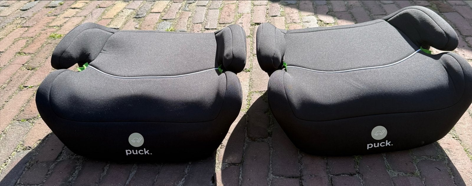 Twee nieuwe Puck autostoelverhogers, Autogordel, 22 t/m 36 kg, Zo goed als nieuw, Ophalen