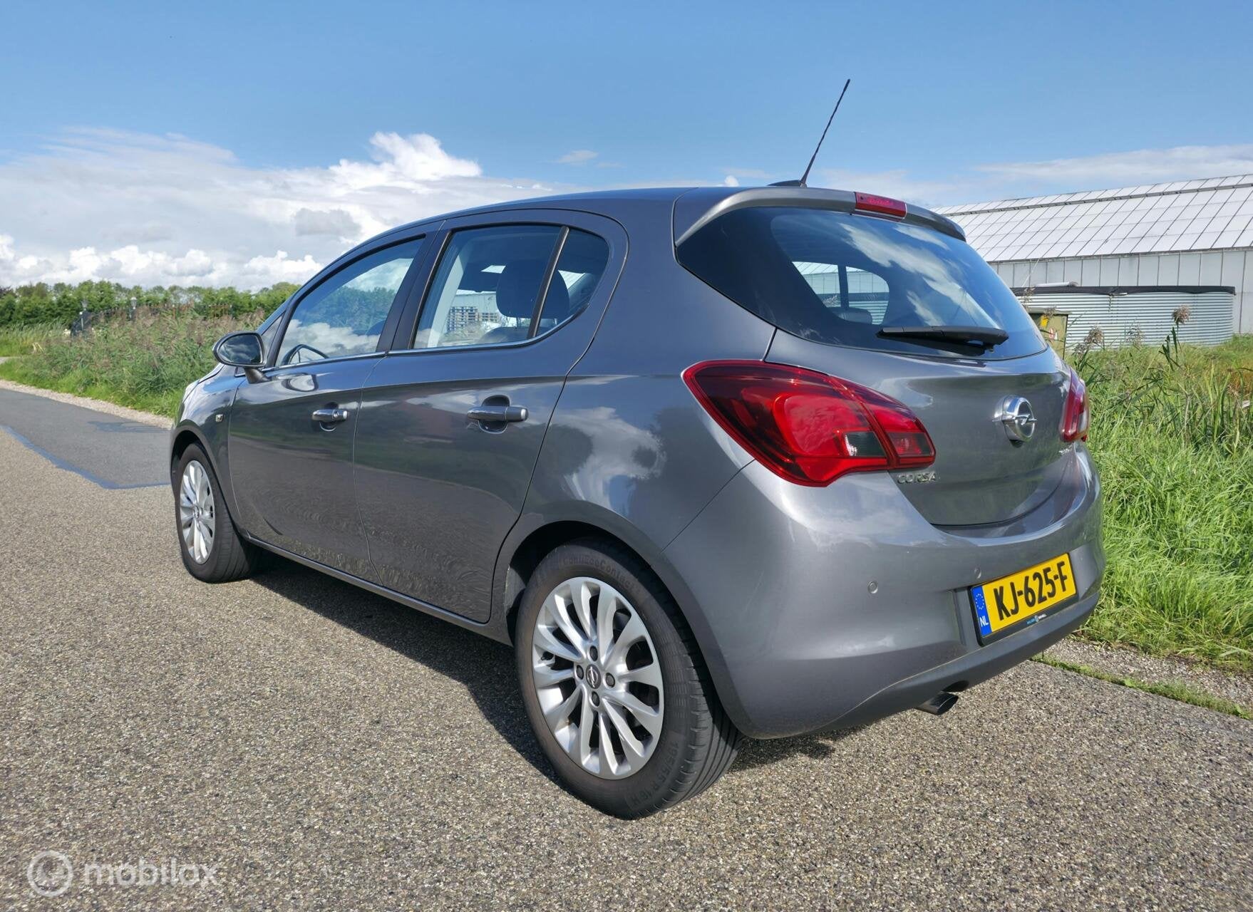 Opel Corsa 1.0 Turbo Business+ / Half leder / Cruise control, Auto's, Voorwielaandrijving, Gebruikt, Leder en Stof, 49 €/maand