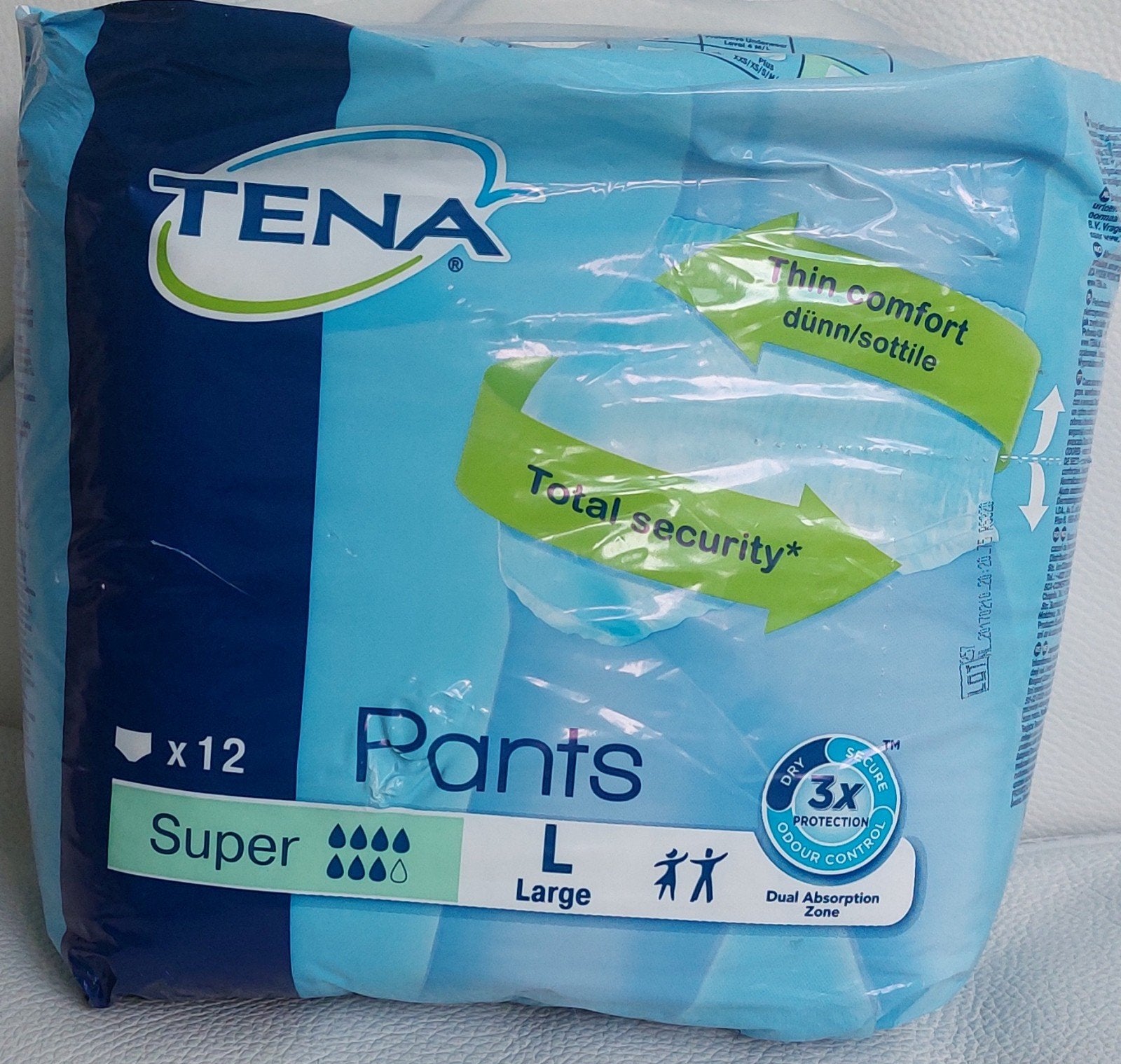 TENA PANTS L man/vrouw 12 stuks, Ophalen of Verzenden, Nieuw