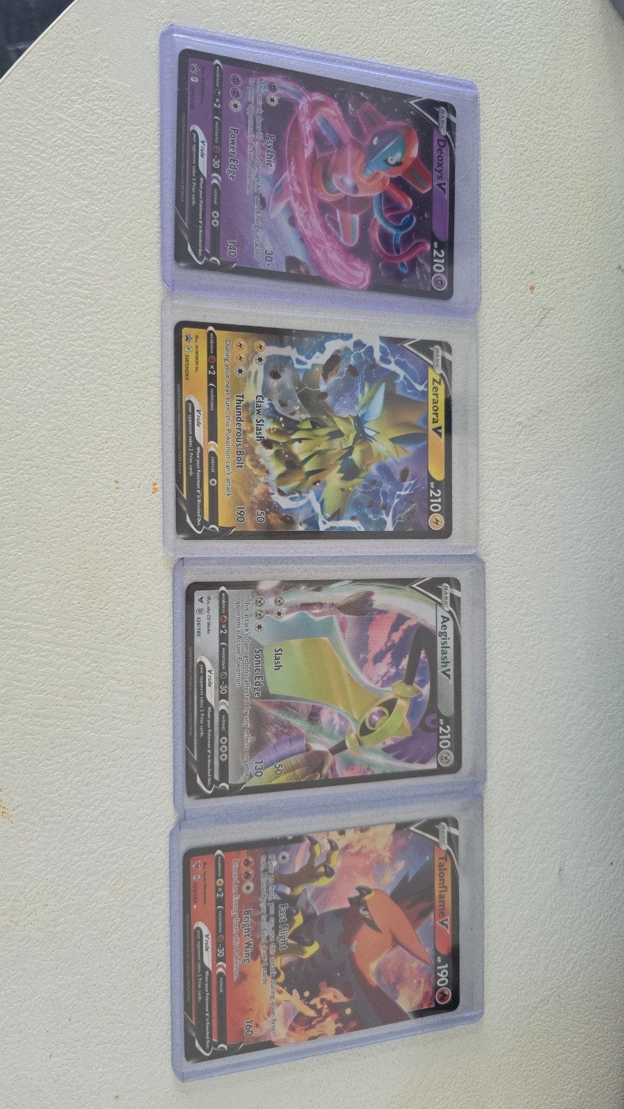 Nieuwe Pokémonkaarten V-serie in sleeve: Deoxys, Zerra, Aeg, Ophalen of Verzenden, Nieuw, Meerdere kaarten