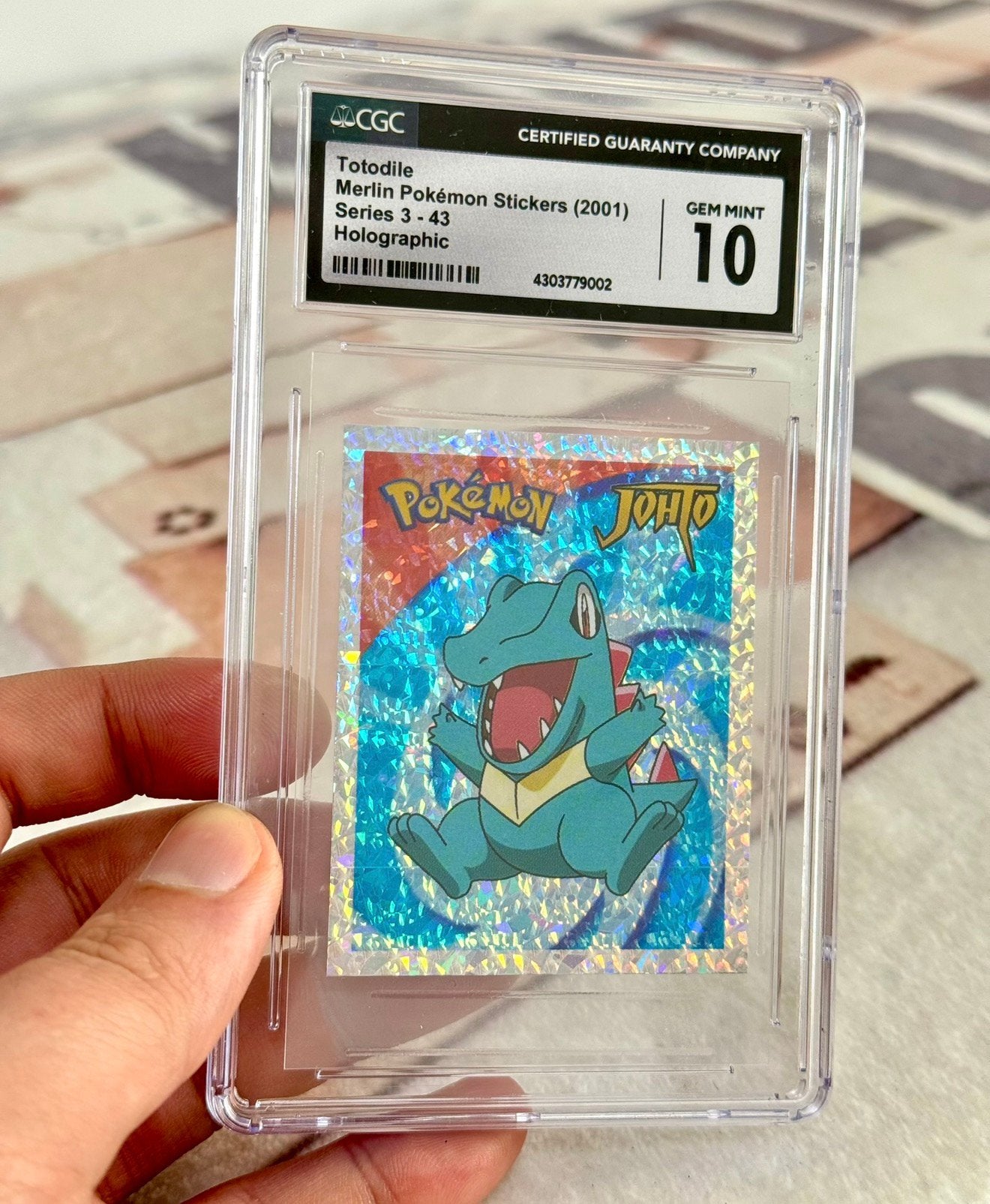 Grade-10 Totodile Merlin Pokemon Stickers 2001 Series 3-43, Ophalen of Verzenden, Nieuw, Losse kaart, Foil