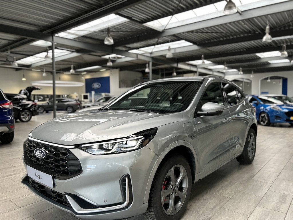 Ford Kuga 2.5 PHEV 243 pk ST-Line X I AGR stoelen | Adapt Cr, Auto's, Ford, 12 maanden, 14 kWh, Gebruikt, Zwart