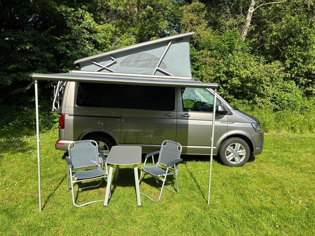 VW T6 California ocean Bulli 204 pk DSG 4motion, Caravans en Kamperen, Campers, Automaat, Buscamper of Camperbus, Volkswagen, Treinzit