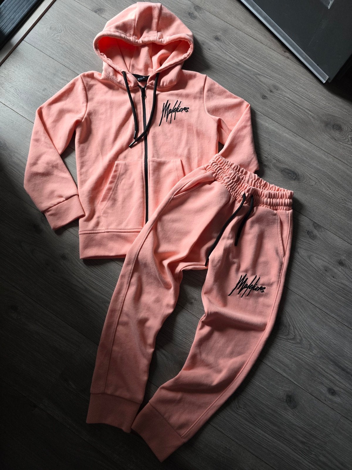 Lichtroze trainingspak Malelions, maat 140, Nieuw (VL1), Kleding | Dames, Ophalen of Verzenden, Nieuw, Maat 34 (XS) of kleiner