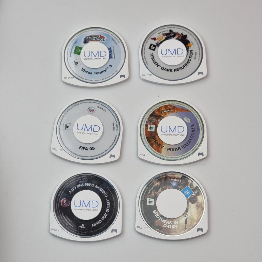 PSP Street E1004 ( Playstation Portable ) + 19 Games, Sony, Zo goed als nieuw, Support@sony.com, 1-7-1 Konan, Minato-ku
Tokyo 108-0075
Japan
