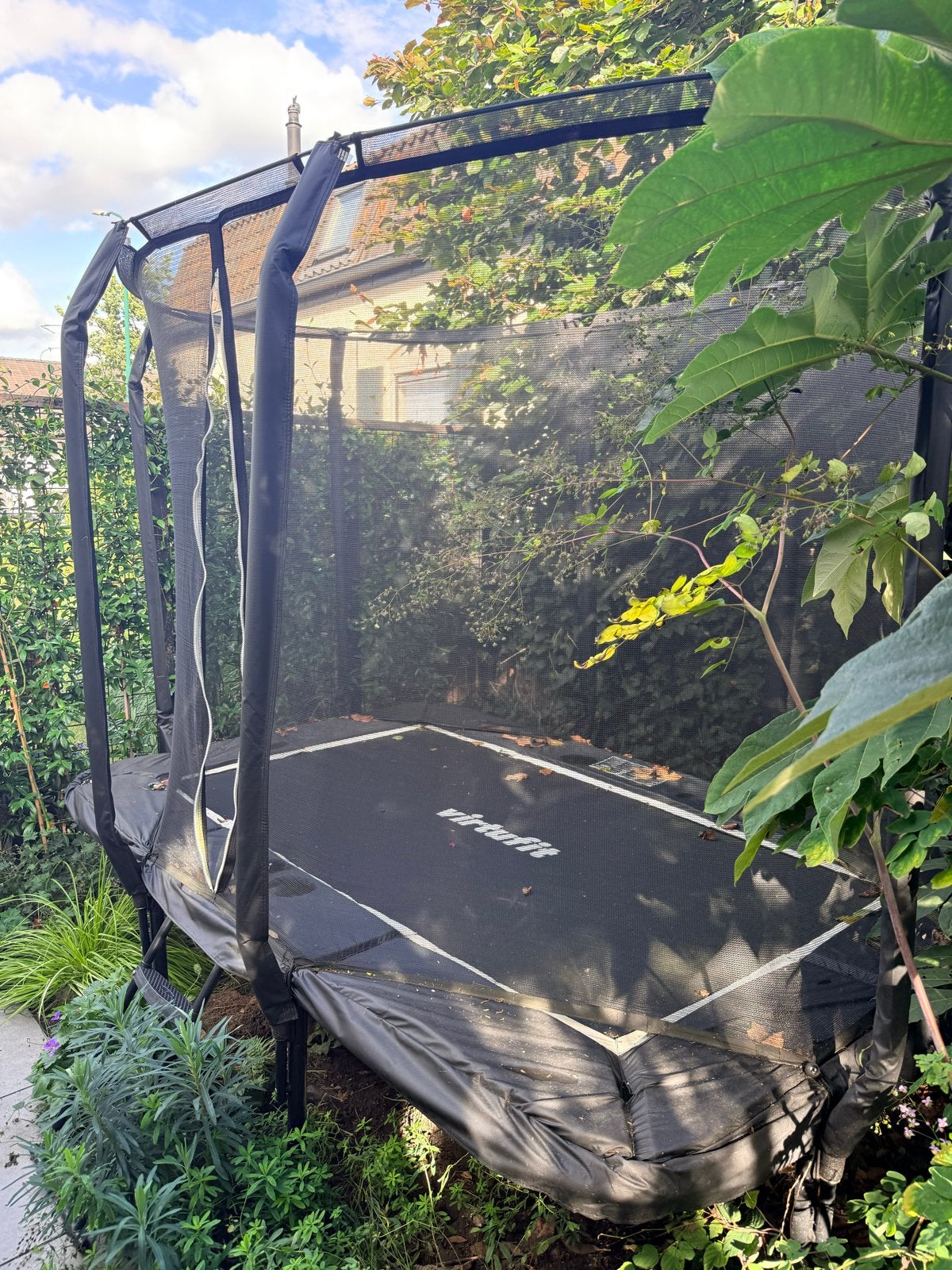 Trampoline met net en trapje - 280x190 cm, Ophalen, Gebruikt