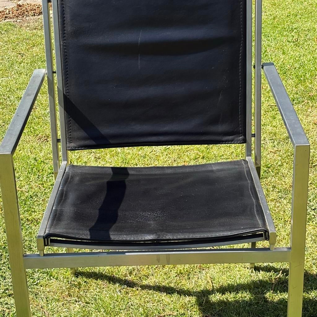 4 stapelbare design stoelen RVS met zwart leer, Huis en Inrichting, Gebruikt, Zwart, Leer, Ophalen of Verzenden