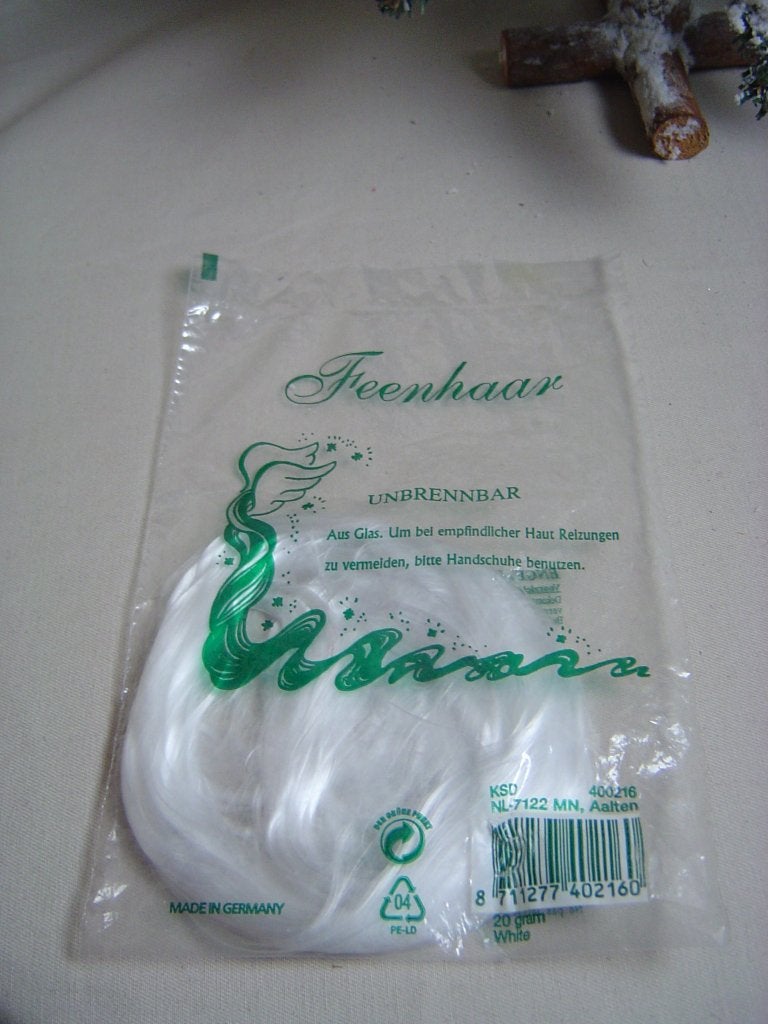 Zakje engelenhaar 10 gram kerstdecoratie, Ophalen of Verzenden, Zo goed als nieuw
