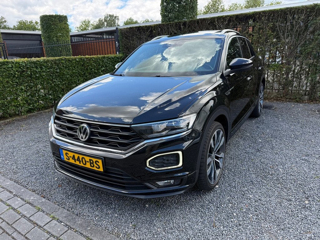 Volkswagen T-Roc 1.5 TSI Sport Business R, Auto's, Volkswagen, 4 cilinders, 150 pk, Zwart, Automatische klimaatregeling