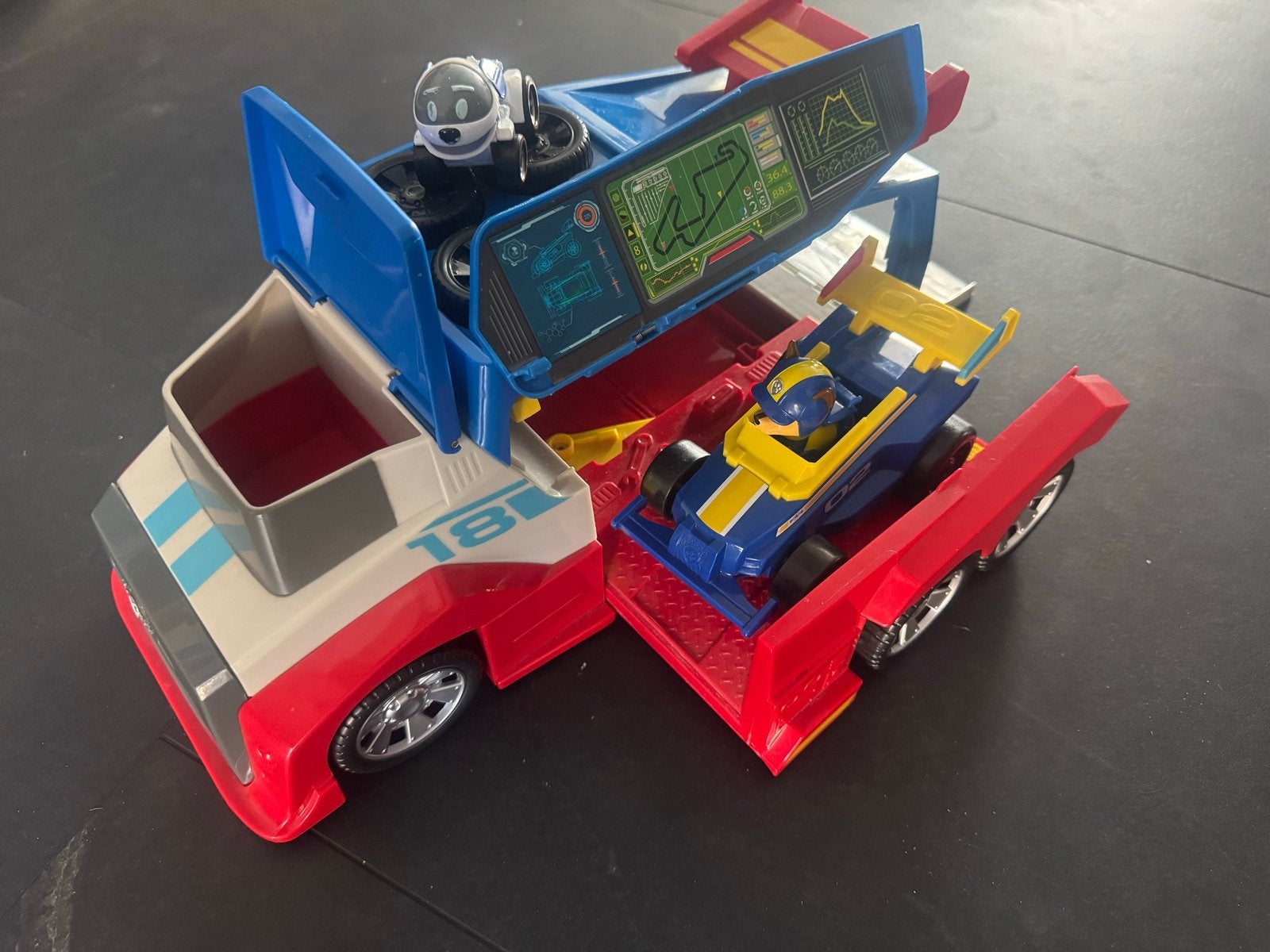 Paw Patrol Race Truck met raceauto en robot, Ophalen of Verzenden, Gebruikt