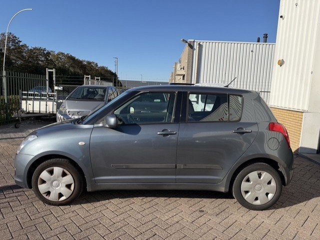 Suzuki Swift 1.3 Limited AIRCO 4X4, Auto's, Voorwielaandrijving, Dealer onderhouden, Stof, Zwart