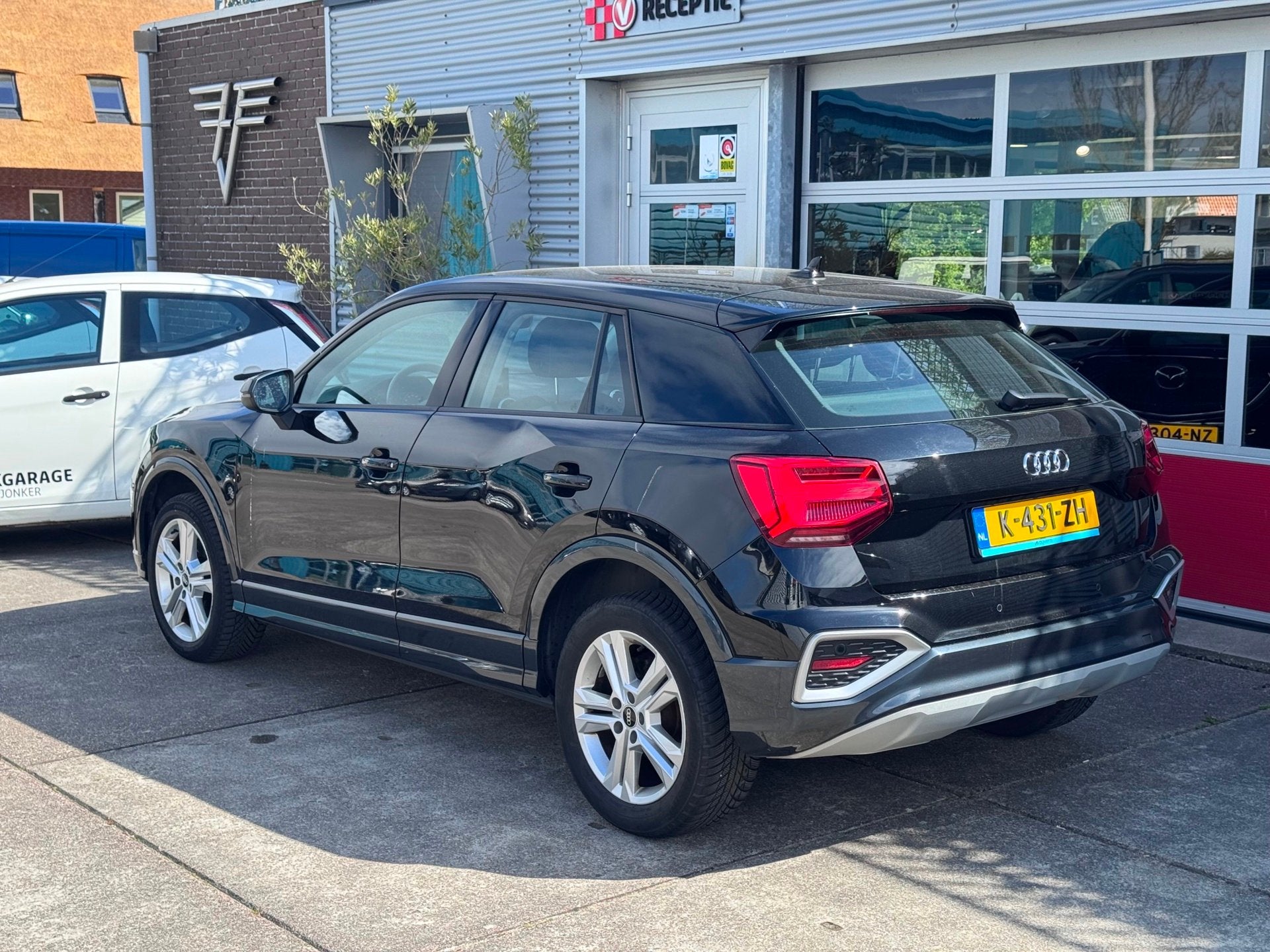 Audi Q2 30 TFSI Business Edition, Auto's, Voorwielaandrijving, Dealer onderhouden, Gebruikt, Zwart