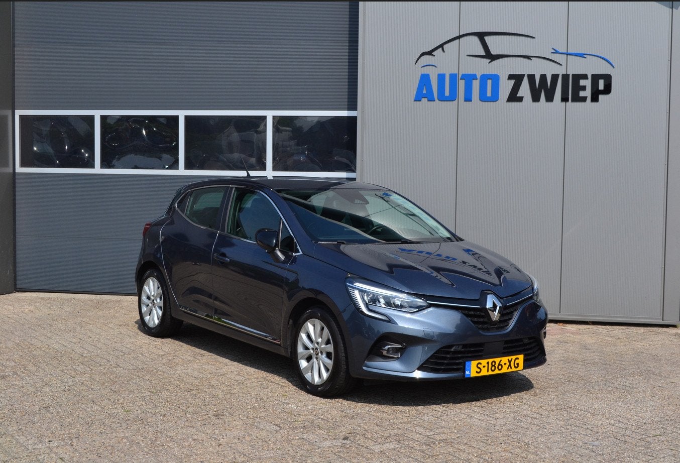 Renault Clio 1.3 TCe Intens Stoelverwarming/camera/trekhaak, Auto's, Automatische klimaatregeling, 15 km/l, Euro 6, 4 cilinders