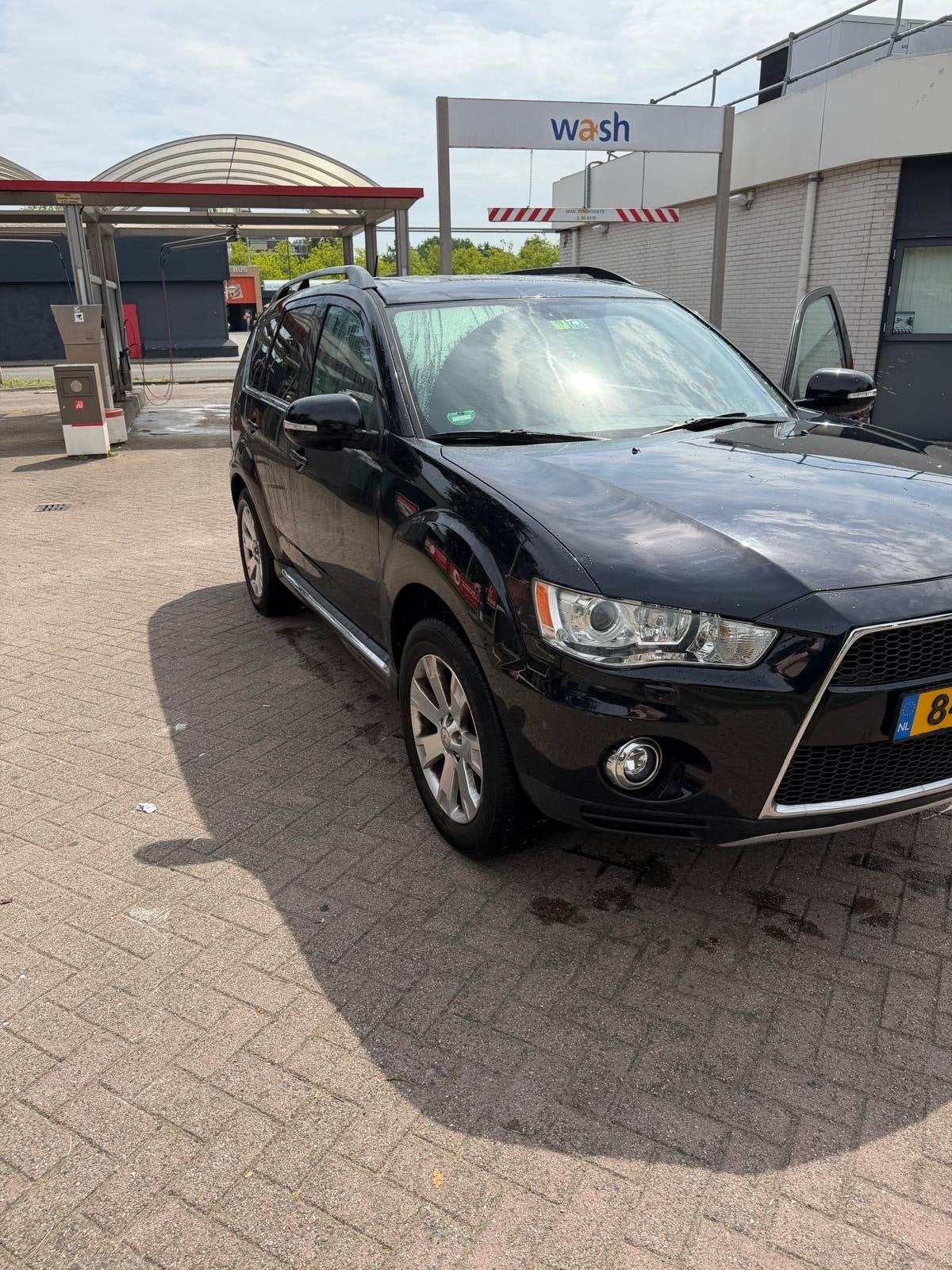 Mitsubishi Outlander 2.0 MPI 2WD CVT 2012 Zwart, Auto's, 1998 cc, Outlander, 4 cilinders, Zwart