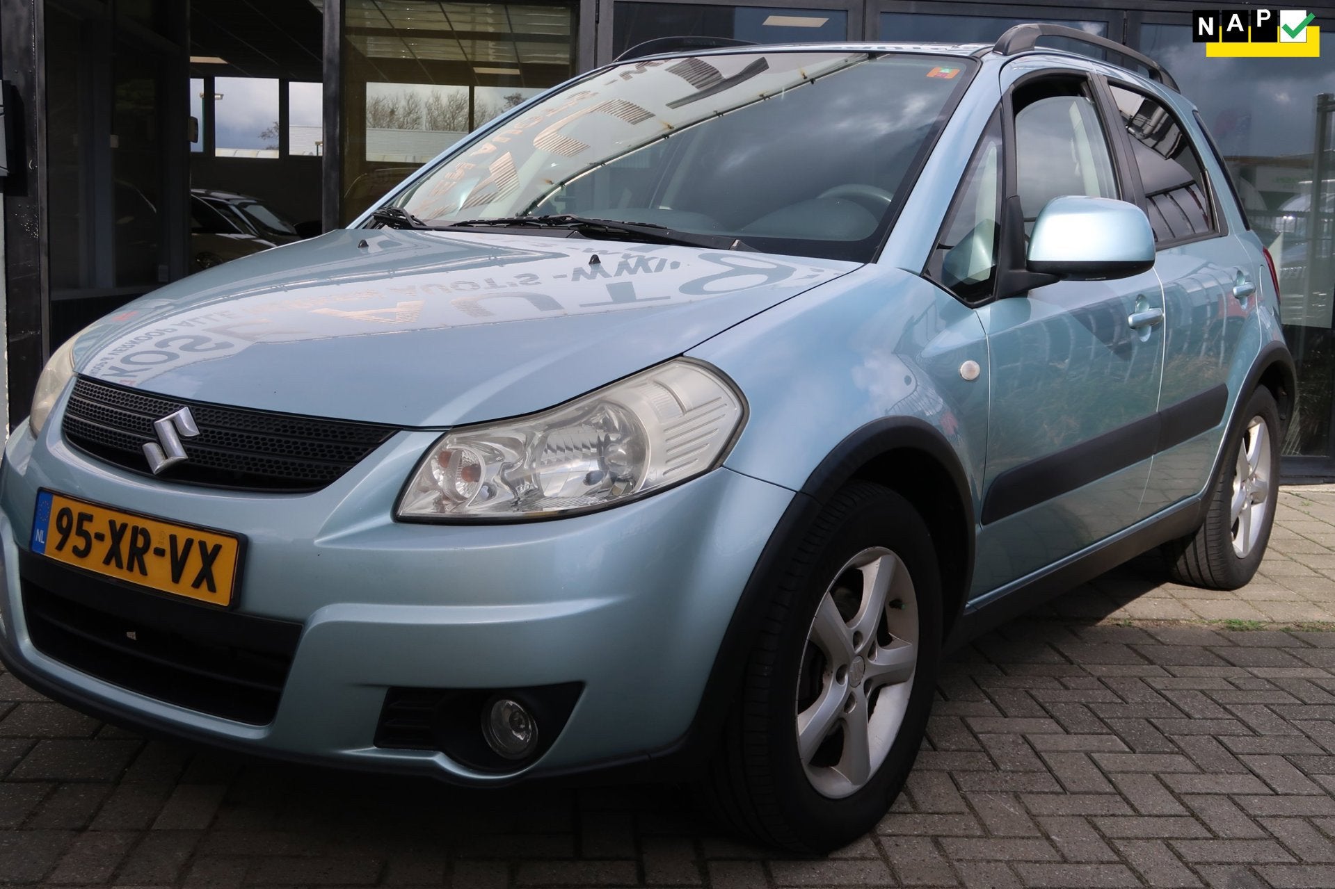 Suzuki SX4 1.6 Shogun *Rijklaarprijs *Trekhaak *NAP, Auto's, Dealer onderhouden, Gebruikt, Zwart, 4 cilinders