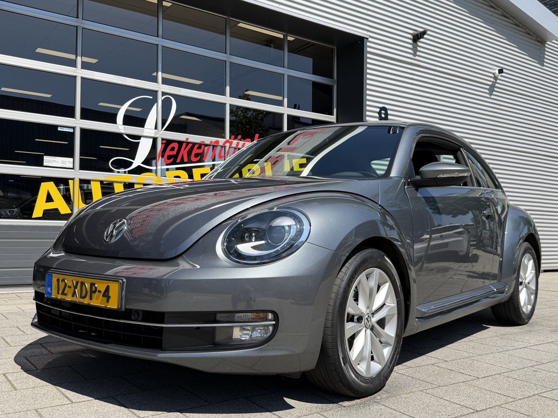 Volkswagen Beetle 1.2 TSI Designo Edition - Navigatie I Airc, Voorwielaandrijving, Euro 5, Stof, Gebruikt