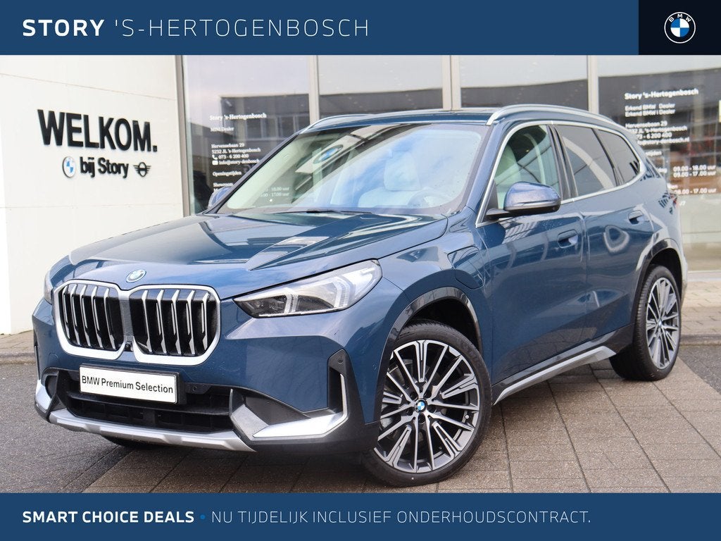 BMW X1 xDrive30e High Executive xLine Automaat / Panoramadak, Auto's, BMW, 1800 kg, Euro 6, Blauw, Leder en Stof