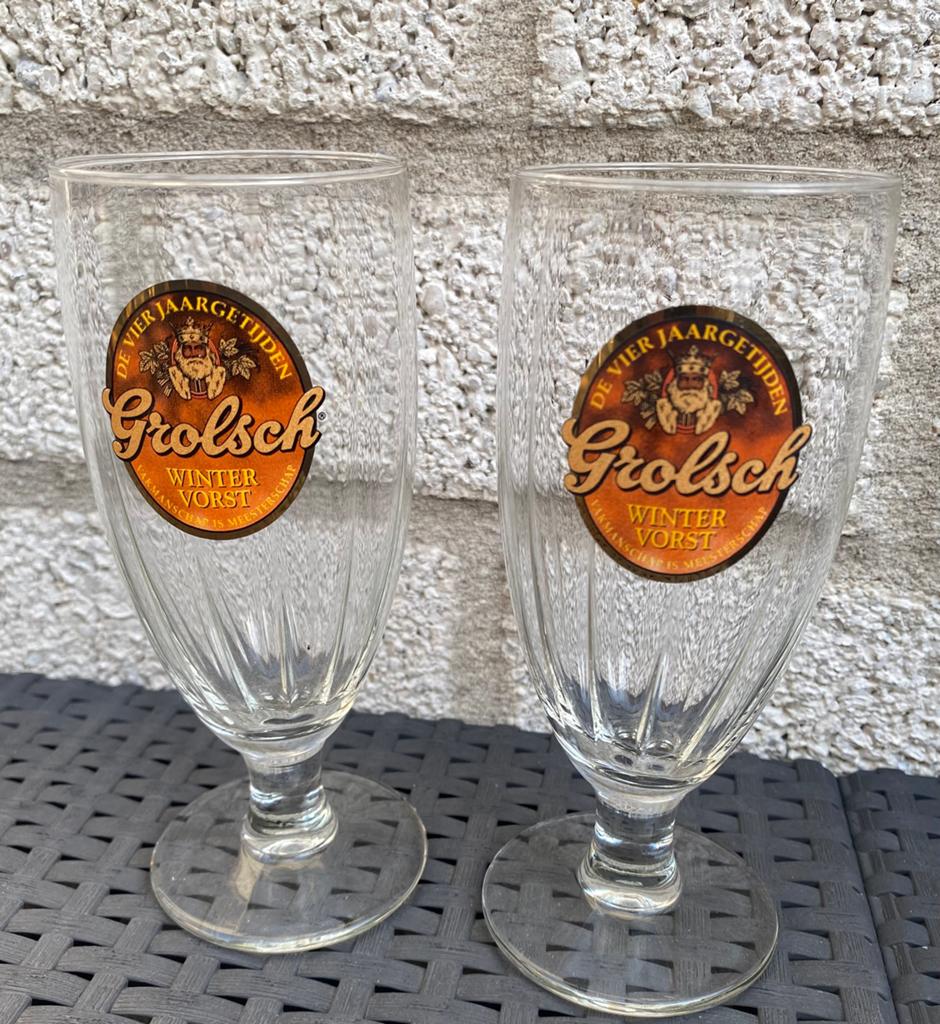 2 Grolsch winter vorst bierglazen op voet. H. 16 cm., Verzamelen, Biermerken, Ophalen of Verzenden, Zo goed als nieuw, Glas of Glazen