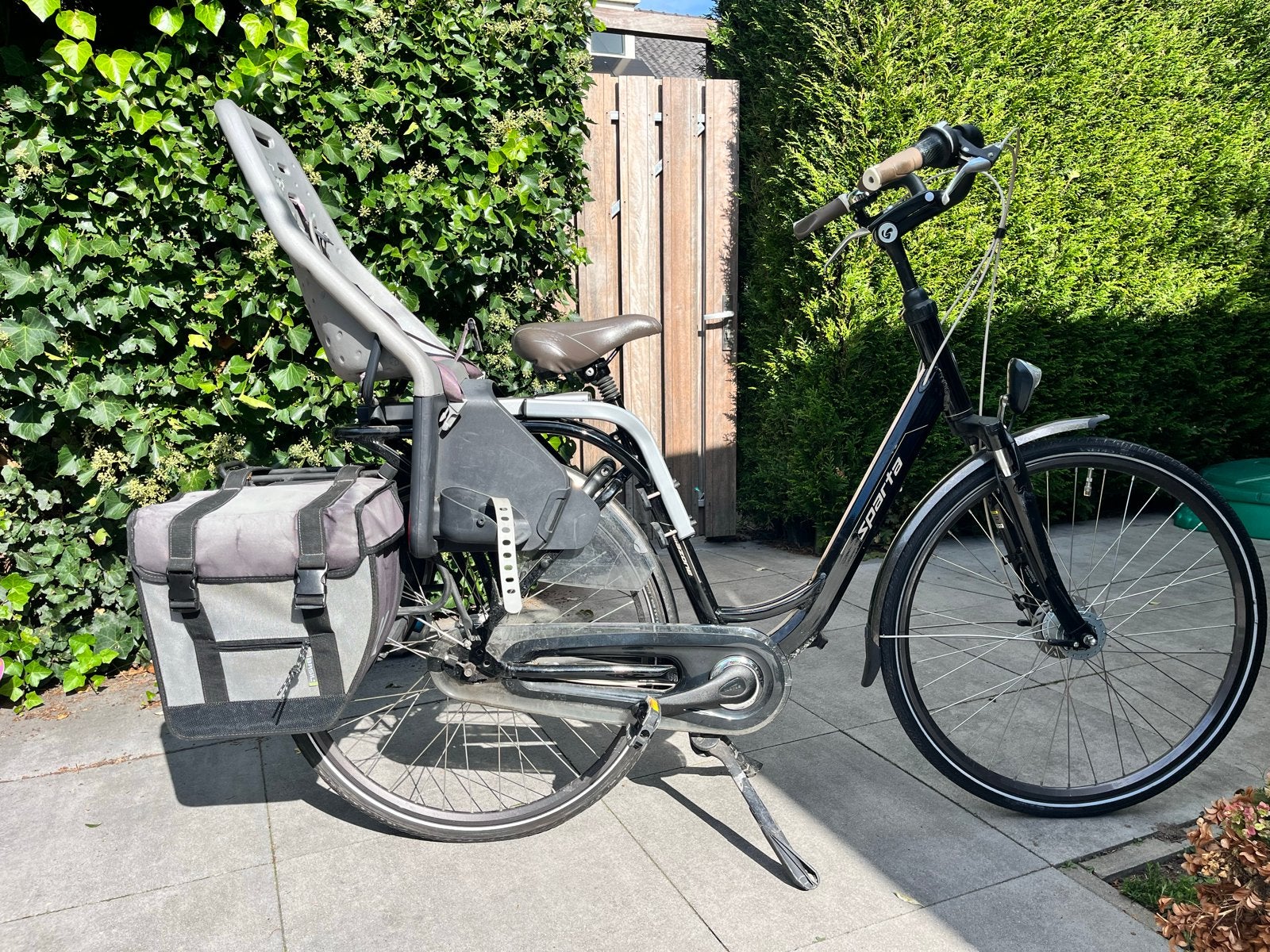 Sparta Amazone Damesfiets met Yepp zitje en fietstassen, Ophalen, Sparta, Gebruikt, Velgrem