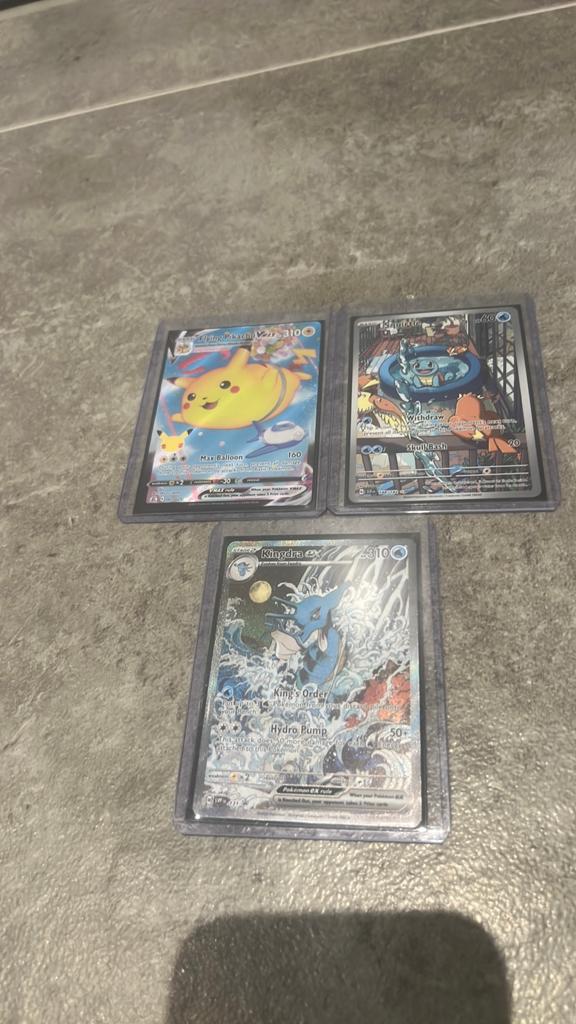 Pokemon kaarten. Squirtle/Kingdra/ Flying pikachu, Ophalen of Verzenden, Zo goed als nieuw, Meerdere kaarten