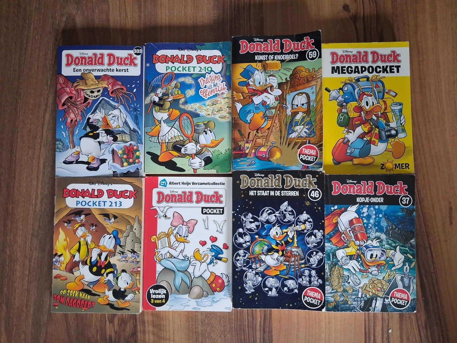 Donald Duck Pockets en Megapocket - 8 stuks, Boeken, Meerdere stripboeken, Ophalen, Gelezen