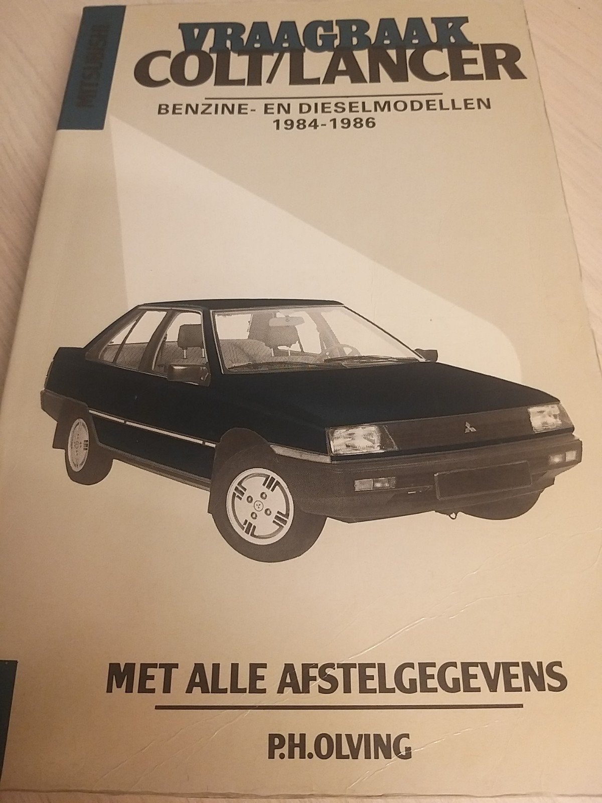 jaren 80 nieuwstaat Mitsubishi Colt Lancer vraagbaak werkpla, Ophalen of Verzenden