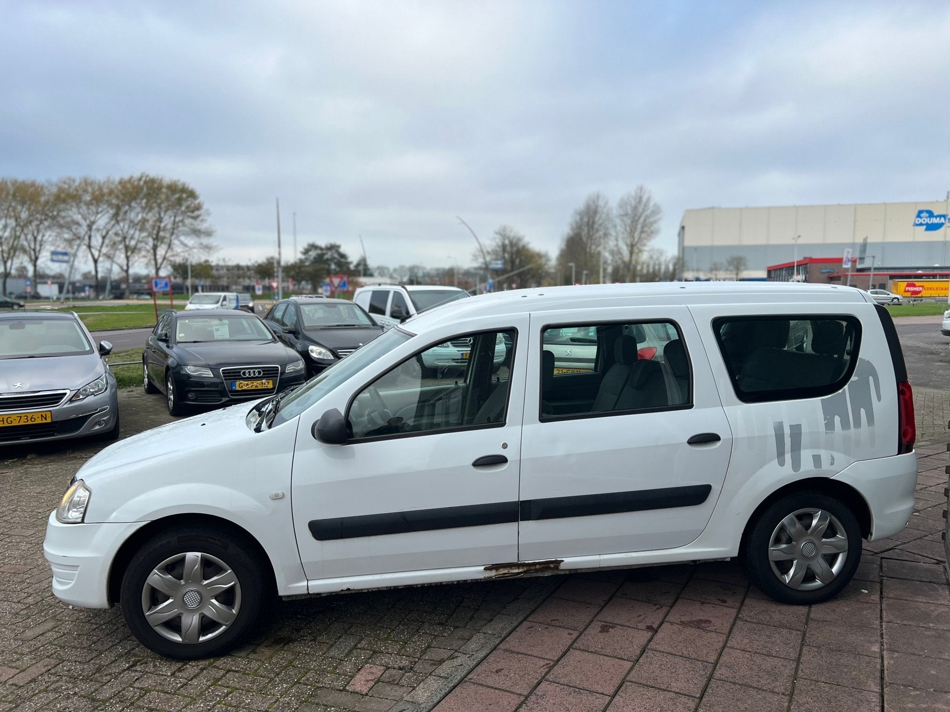 Dacia Logan MCV 1.6 Ambiance 7P - Airco -, Stof, Gebruikt, Zwart, 4 cilinders
