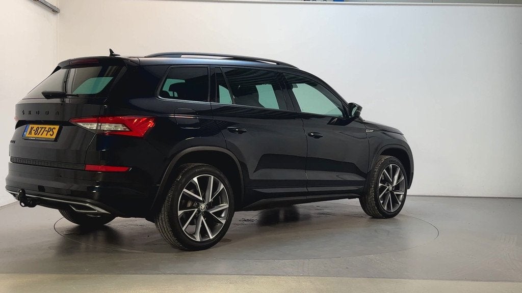 Skoda Kodiaq 1.5 TSI 150pk DSG Sportline Business Panoramada, Auto's, Skoda, 4 cilinders, 1481 kg, Zwart, Origineel Nederlands