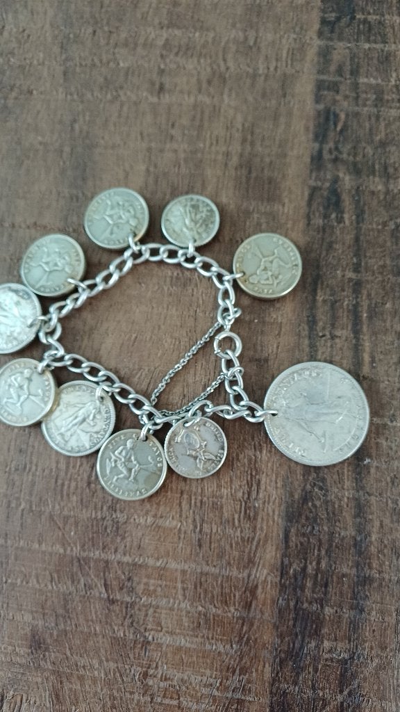 Zilverkleurige armband met Philippijnse munten, 1944, Sieraden, Tassen en Uiterlijk, Antieke sieraden, Ophalen of Verzenden, Overige materialen