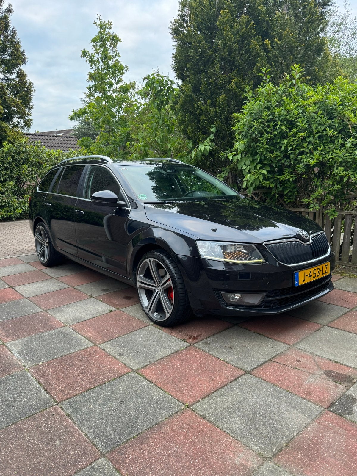 Skoda Octavia 1.8 TSI 132KW Combi DSG 2013 Zwart, Auto's, Skoda, 4 cilinders, 179 pk, Zwart, 1252 kg
