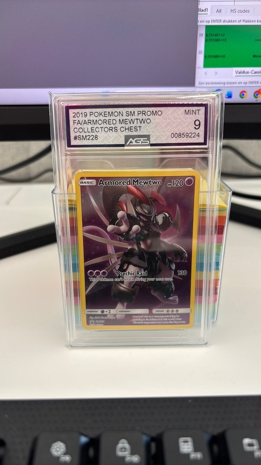 Pokémon Armored Mewtwo SM228 Promo – AGS 9 Graded – Mint, Ophalen of Verzenden, Zo goed als nieuw, Losse kaart