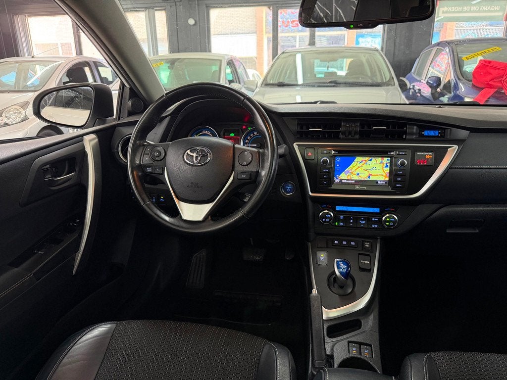 Toyota Auris 1.8 Hybrid Dynamic vol opties, Auto's, Toyota, Euro 5, Gebruikt, 4 cilinders, Wit