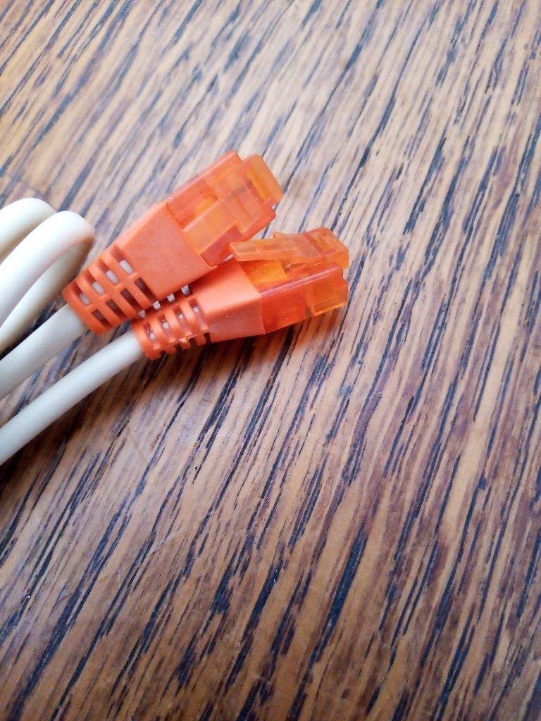 Nieuwe KPN Ethernetkabel oranje (1.5 meter) UTP cat 6 2000, Computers en Software, Ophalen of Verzenden, Nieuw
