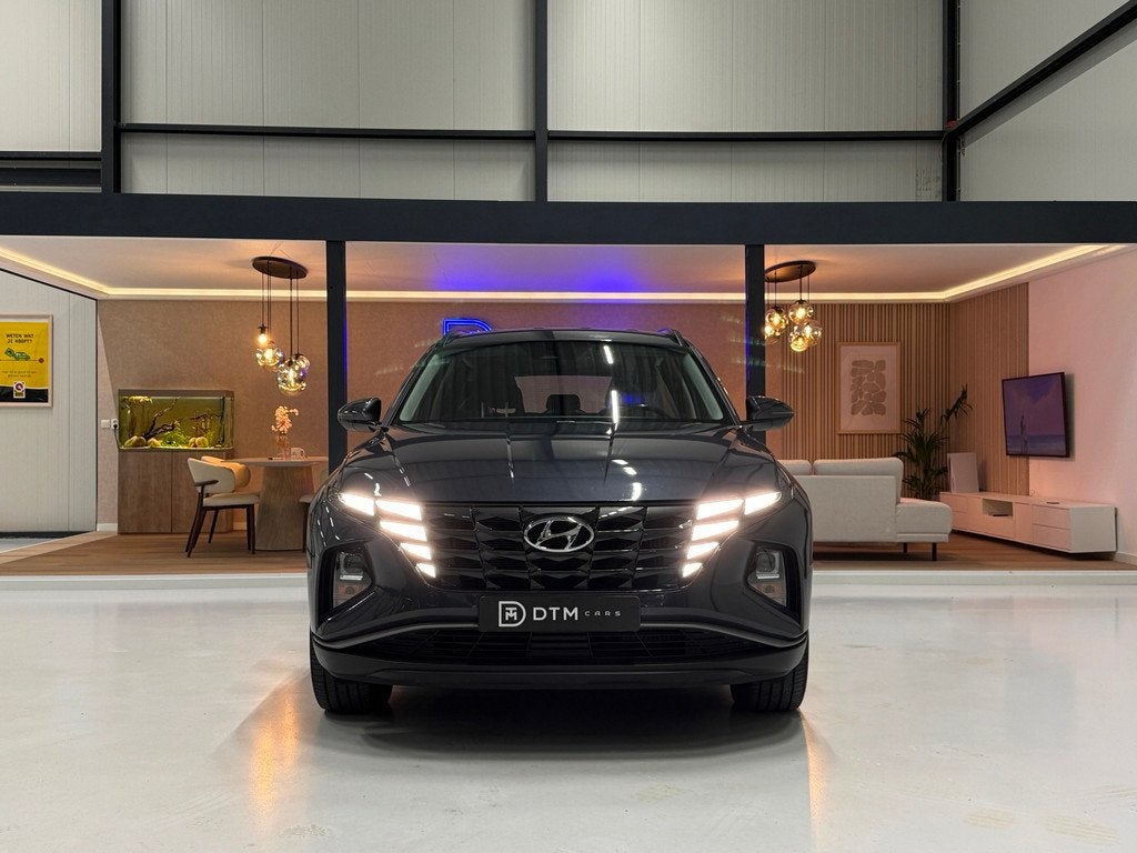 Hyundai Tucson 1.6 Plug-in Hybrid 265pk Vierwielaandrijving, Auto's, Hyundai, Automaat, Stof, Gebruikt, 4 cilinders