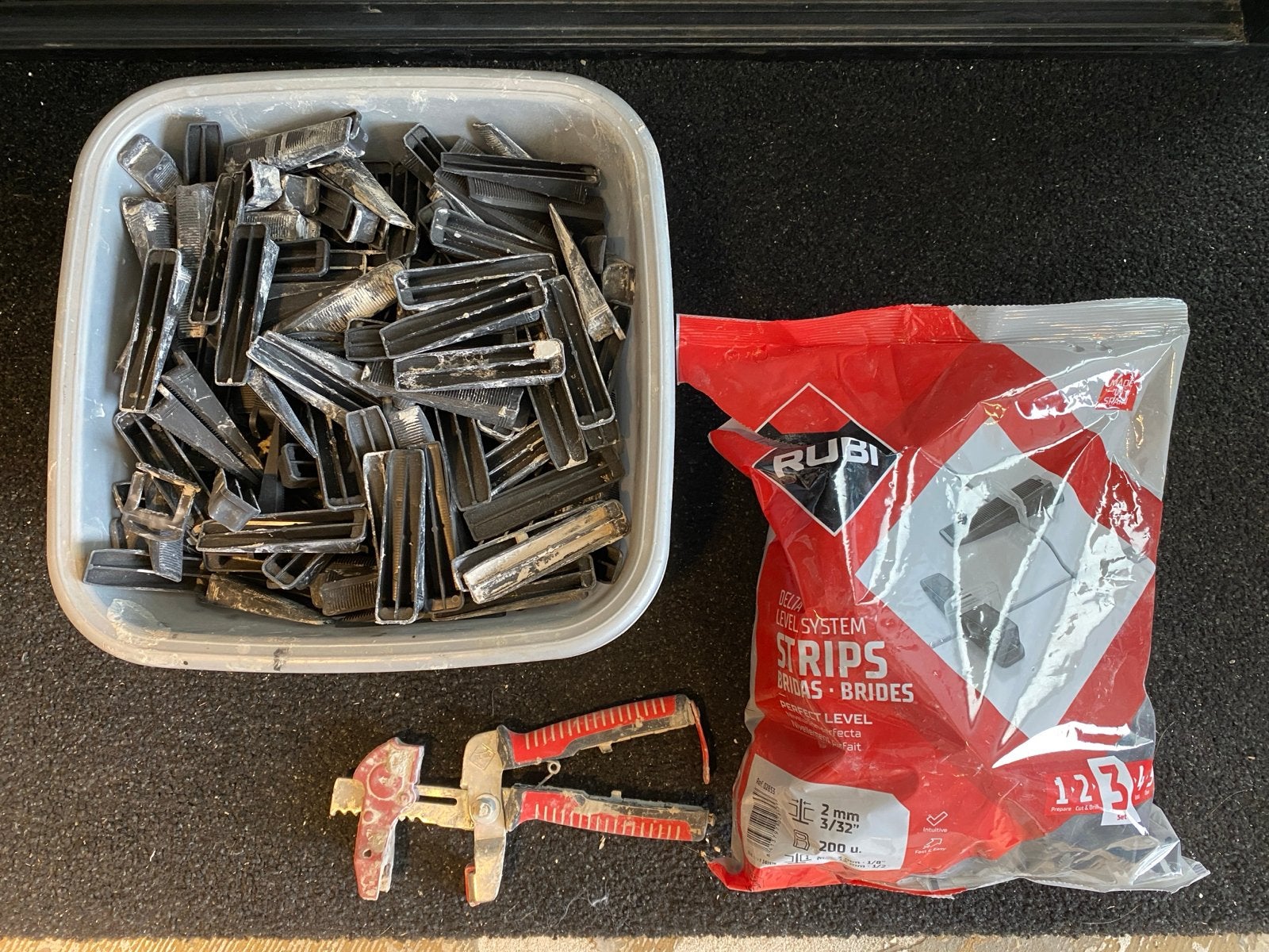 Tegel leveling systeem - Rubi strips en tang, Overige materialen, Gebruikt, Overige typen, Ophalen of Verzenden
