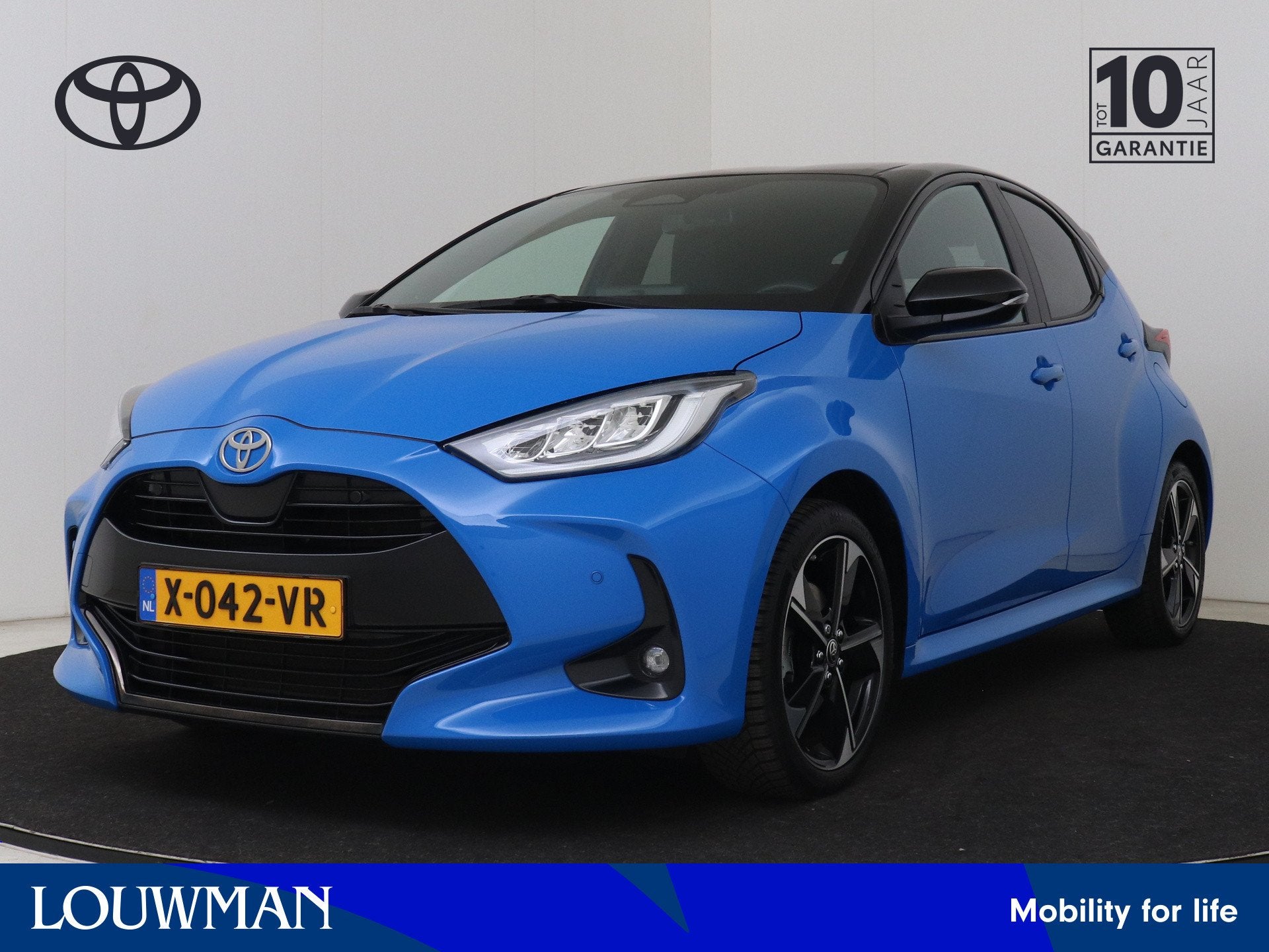 Toyota Yaris 1.5 Hybrid 130 Launch Edition | NL dealeronderh, Auto's, 12 maanden, 450 kg, Gebruikt, Blauw