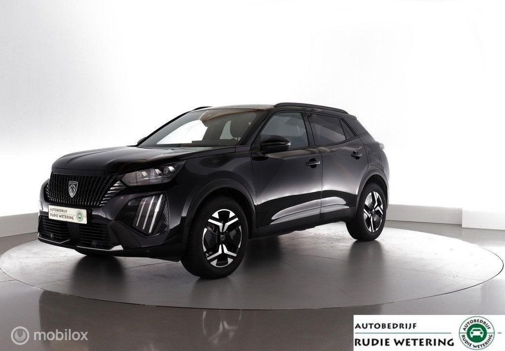 Peugeot 2008 1.2 Hybrid 136 GT automaat GT leer|led|cam360|e, Auto's, 1272 kg, 136 pk, Gebruikt, 1199 cc
