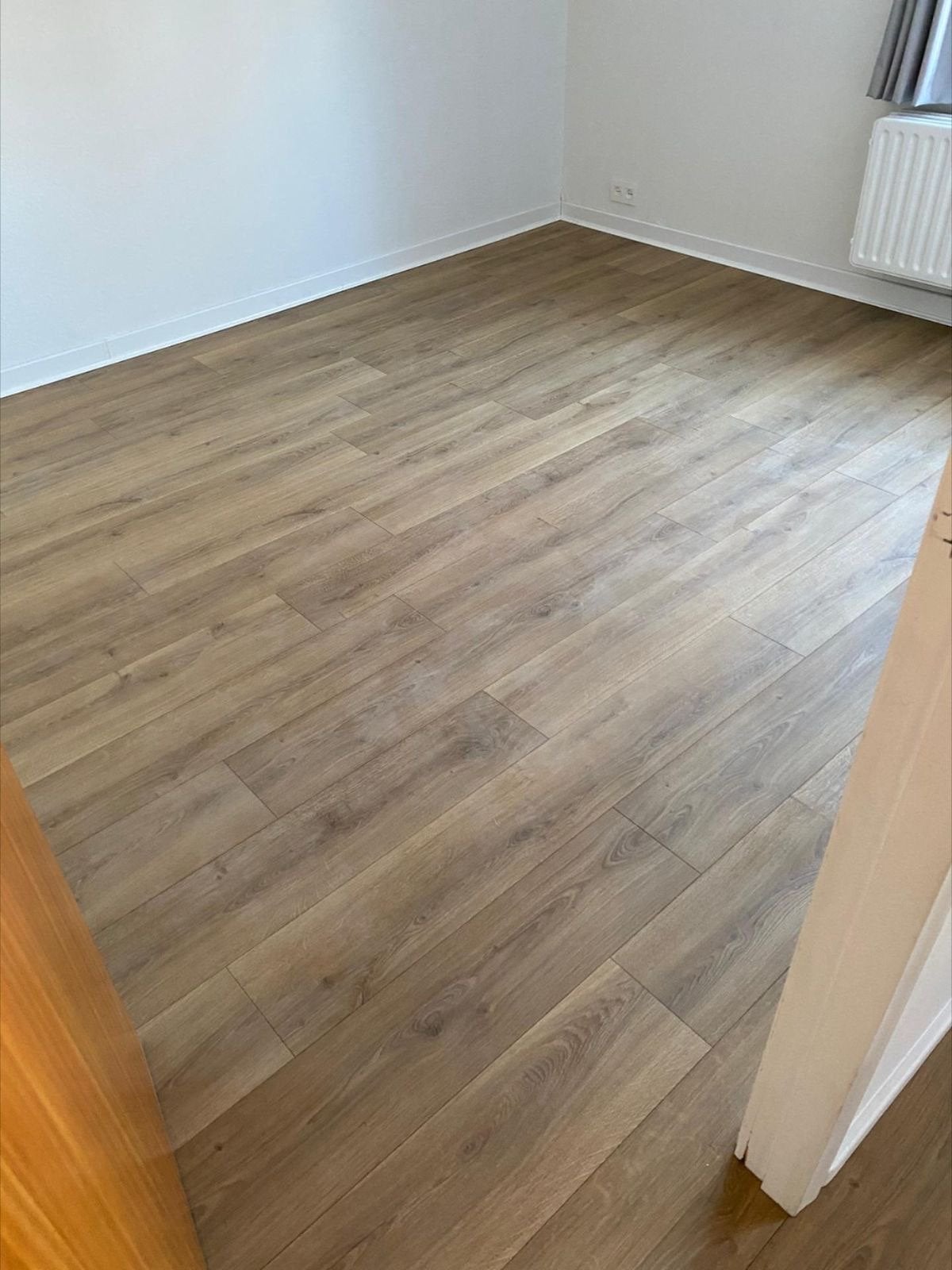 Goedkoop laminaat leggen vanaf €150 per kamer-HEEL NEDERLAND, Laminaat of Parket