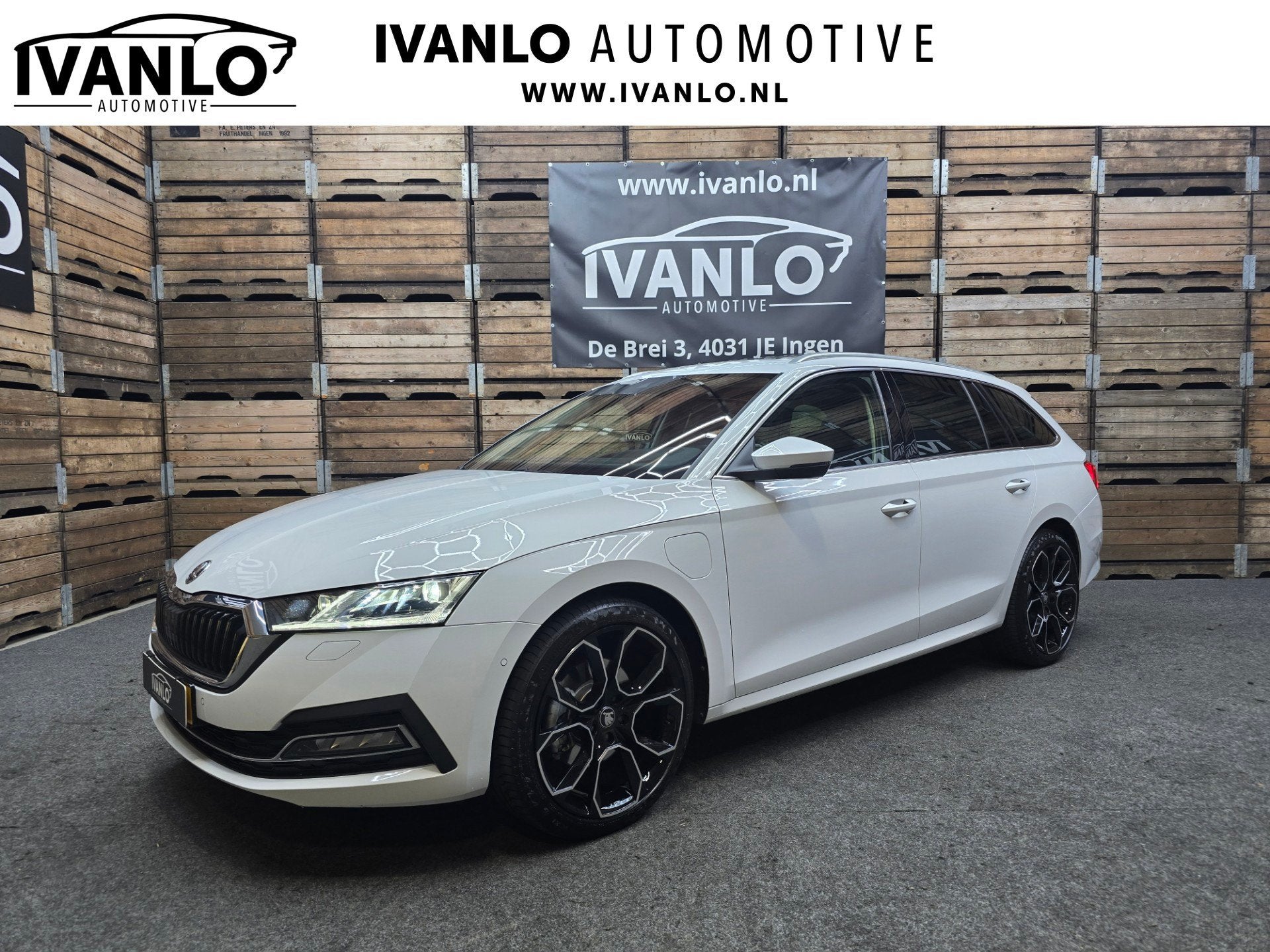 Skoda Octavia Combi 1.4 TSI iV PHEV Business Edition Plus Pa, Auto's, Gebruikt, Wit, Automatische klimaatregeling, Octavia