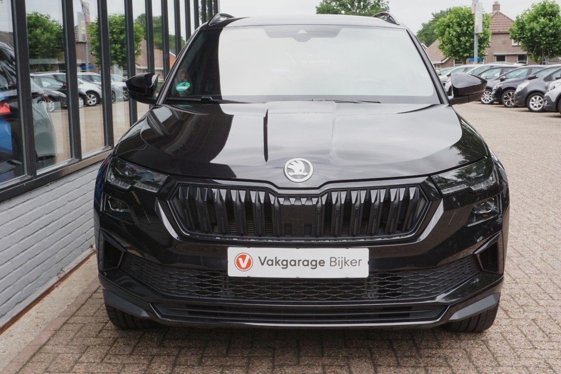 Skoda Karoq 1.5 TSI ACT Sportline Business Camera/Navi/App-C, Auto's, 12 maanden, Stof, 4 cilinders, Automatische klimaatregeling